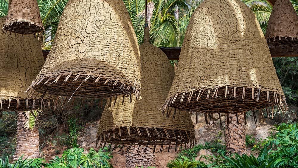 Can N Ibiza estate: woven pendant lights in the garden