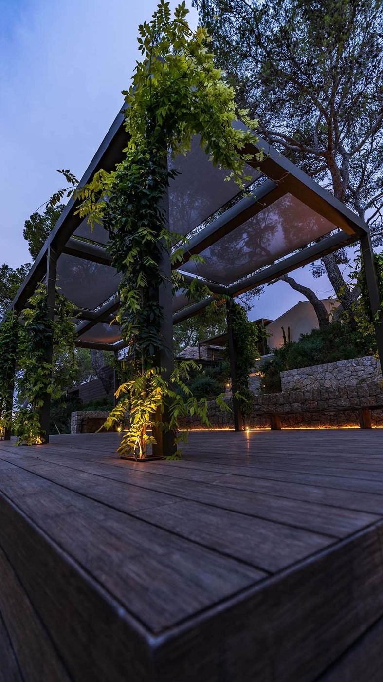 Can N Ibiza estate: garden deck at dusk