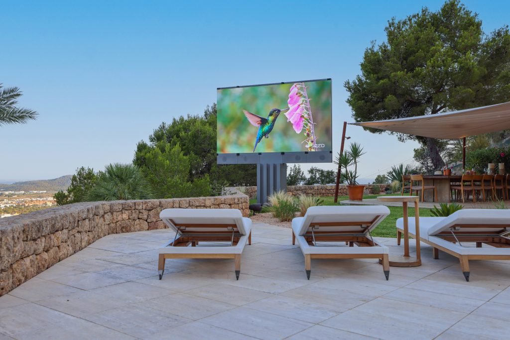 C-Seed unfoldable TV in a garden